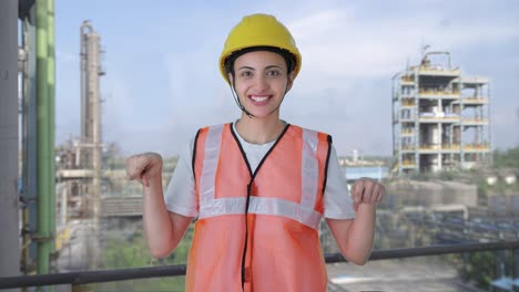 Happy-Indian-female-construction-worker-talking
