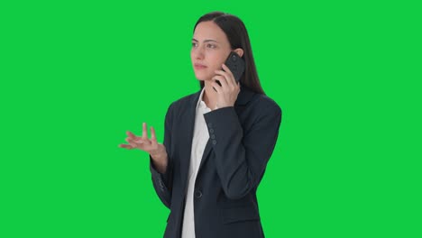 Indian-female-manager-talking-on-phone-Green-screen