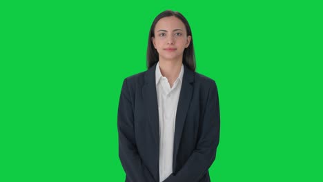 Indian-business-woman-smiling-to-the-camera-Green-screen