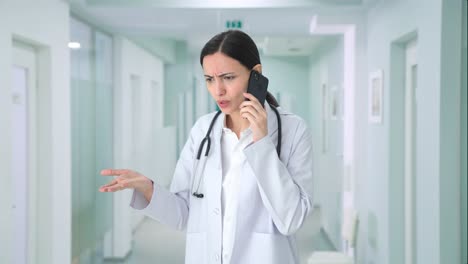 Angry-Indian-female-doctor-shouting-on-phone