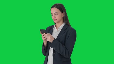 Indian-female-manager-chatting-with-someone-Green-screen
