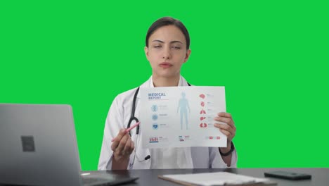 Indian-female-doctor-explaining-medical-report-to-patient-Green-screen