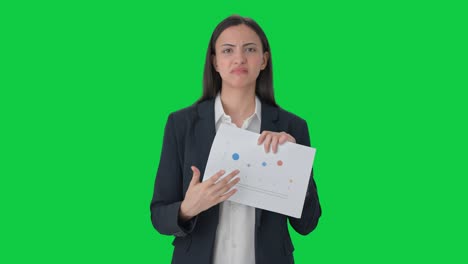 Confused-Indian-business-woman-talking-to-employees-Green-screen