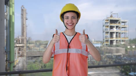 Happy-Indian-female-construction-worker-doing-thumbs-up