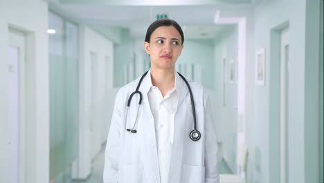 Confused-Indian-female-doctor-asking-what-question