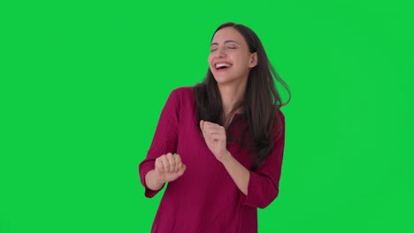 Happy-Indian-girl-dancing-and-enjoying-Green-screen