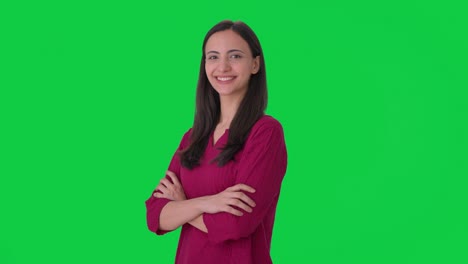 Portrait-of-Happy-Indian-woman-standing-crossed-hands-Green-screen