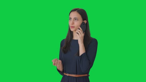 Indian-girl-talking-to-someone-on-call-Green-screen