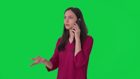 Indian-woman-talking-to-someone-on-call-Green-screen
