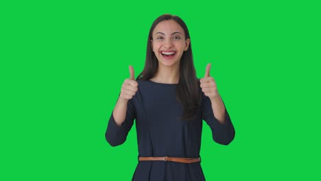 Happy-Indian-girl-showing-thumbs-up-Green-screen