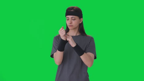 Serious-Indian-woman-getting-ready-for-exercise-Green-Screen