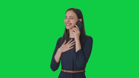 Happy-Indian-girl-talking-to-someone-on-call-Green-screen
