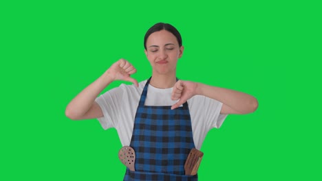 Upset-Indian-housewife-showing-thumbs-down-Green-screen