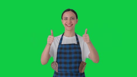 Happy-Indian-housewife-showing-thumbs-up-Green-screen
