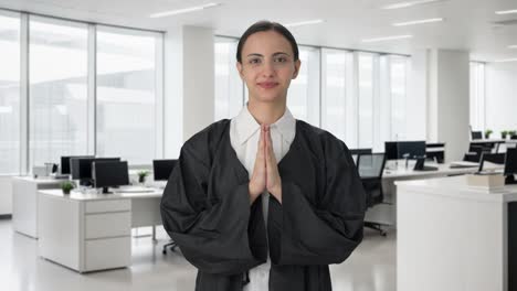 Happy-Indian-female-lawyer-doing-Namaste