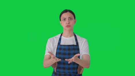 Indian-housewife-talking-to-someone-Green-screen