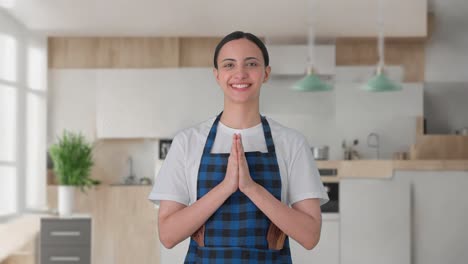 Happy-Indian-housewife-doing-Namaste