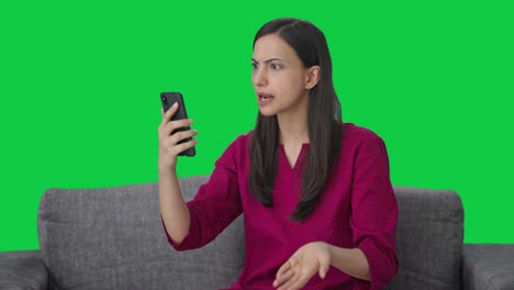 Angry-Indian-woman-shouting-on-someone-on-call-Green-screen