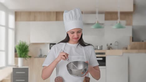 Indian-female-professional-chef-making-food