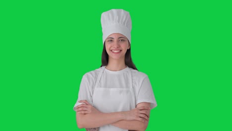 Portrait-of-Happy-Indian-female-professional-chef-Green-screen