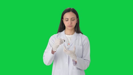 Indian-female-scientist-doing-experiments-Green-screen