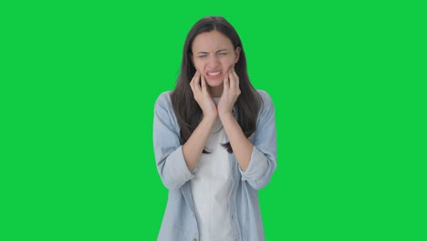 Sick-Indian-girl-suffering-from-tooth-pain-Green-screen