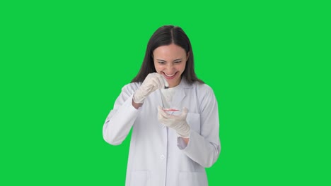 Psychic-Indian-female-scientist-doing-experiments-Green-screen