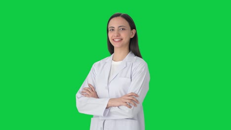 Portrait-of-Happy-Indian-female-scientist-standing-crossed-hands-Green-screen