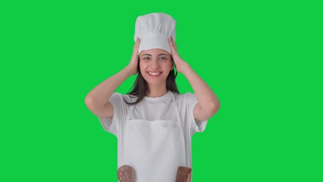 Happy-Indian-chef-wearing-hat-Green-screen