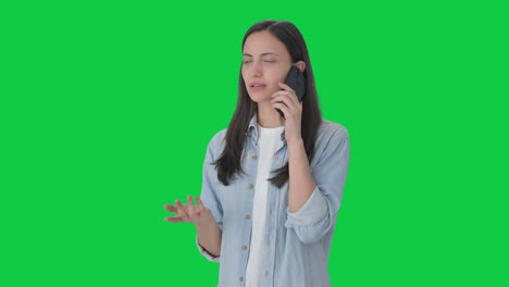 Indian-girl-talking-with-someone-on-call-Green-screen