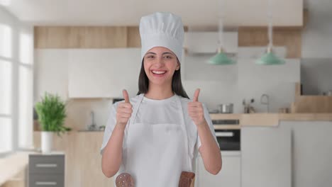 Happy-Indian-female-professional-chef-showing-thumbs-up