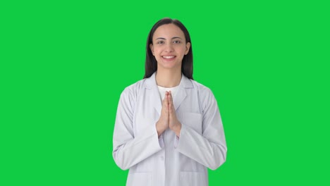 Happy-Indian-female-scientist-doing-Namaste-Green-screen