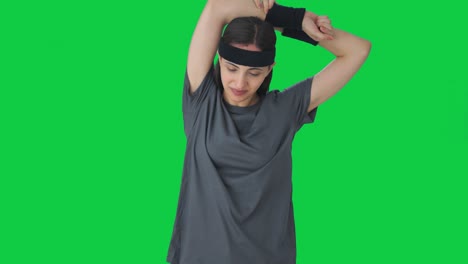 Happy-Indian-girl-doing-arm-exercise-Green-screen