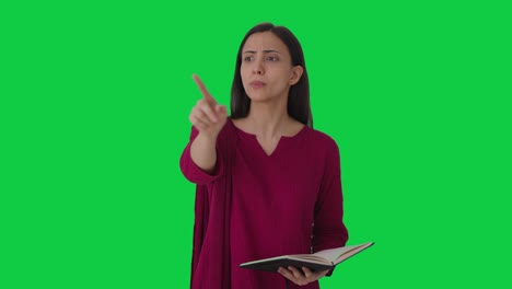 Angry-Indian-female-teacher-shouting-on-students-Green-screen