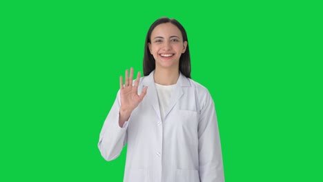 Happy-Indian-female-scientist-doing-Hello-Green-screen