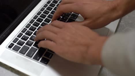 Hand-typing-on-laptop-keyboard,-personal-computer-use-for-work-at-office-or-home