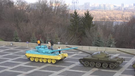 Colorfull-tanks-World-War-Two-at-Motherland-history-museum-with-city-river-views,-Kyiv-Ukraine.