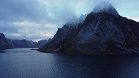 Picturesque-drone-view-of-scenic-fjord-under-gloomy-sky