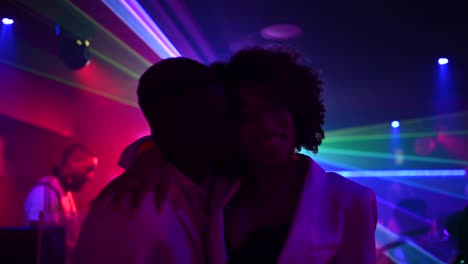 Ethnic-couple-dancing-in-nightclub