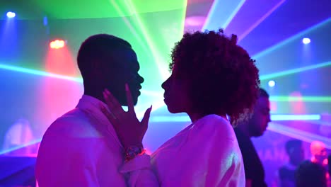 Ethnic-couple-dancing-in-nightclub