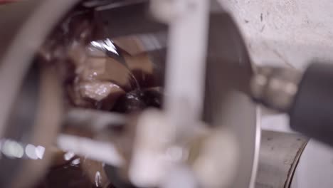 Delicious-liquid-chocolate-mixing-in-conching-machine