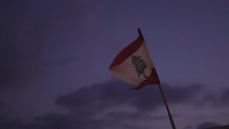 Waving-national-Lebanese-flag-under-evening-sky