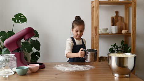 Girl-Pouring-Flour-Into-A-Mixing-Bowl