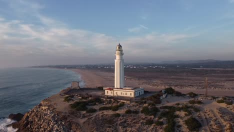Lighthouse-on-cape-near-sea