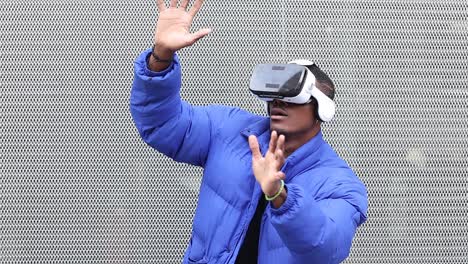 Black-man-experiencing-virtual-reality-in-city