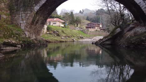 Stone-bridge-over-river-in-Spain