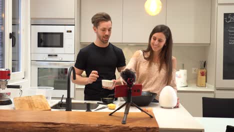 Couple-recording-cooking-tutorial-for-vlog