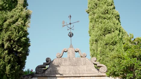 Old-wind-vane-in-rustic-traditional-building