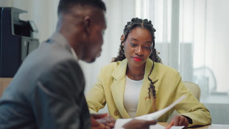 job-interview-and-consultation-with-lawyer-african-american-man-and-woman-are-discussing-in-office