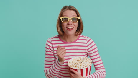 Woman-in-3D-glasses-eating-popcorn-and-watching-interesting-tv-serial,-sport-game-film,-online-movie